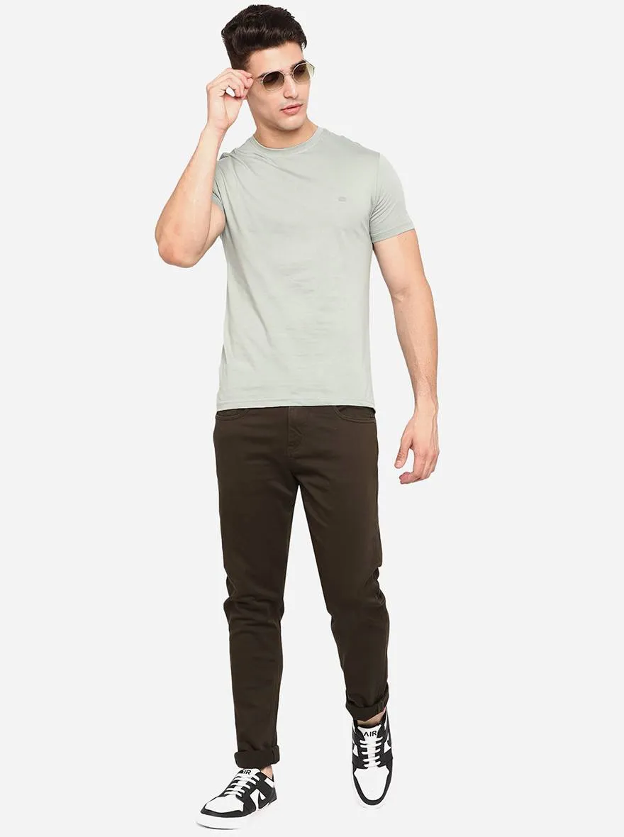 Brown Solid Slim Fit Jeans | JadeBlue